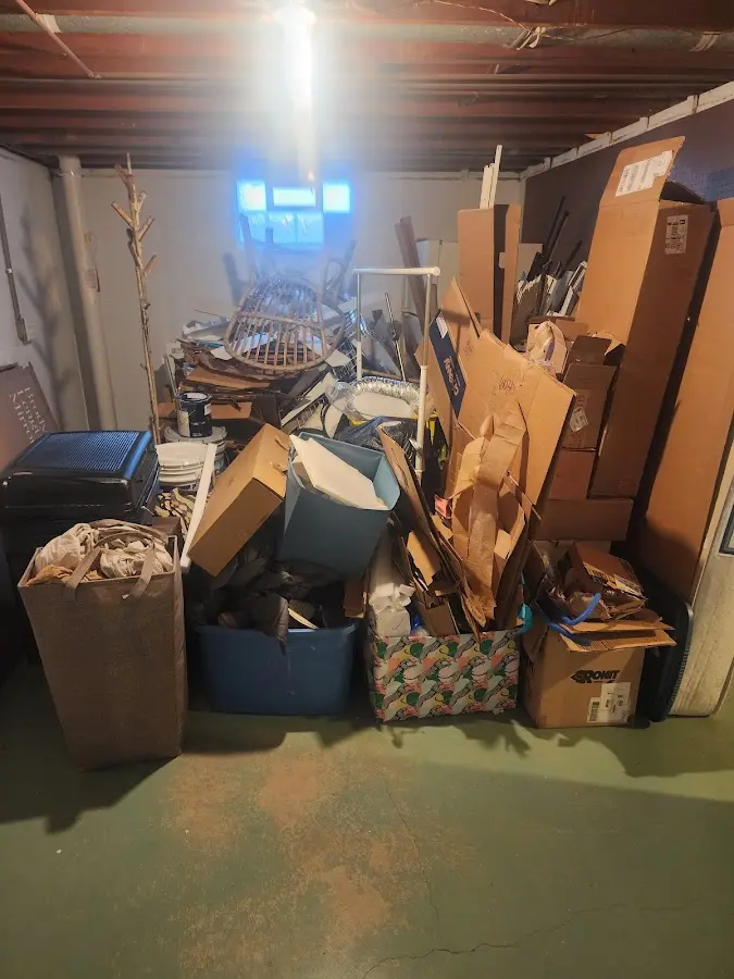 Roll-off dumpster container at job site for 2 Yard Dumpster Rental in Thibodaux